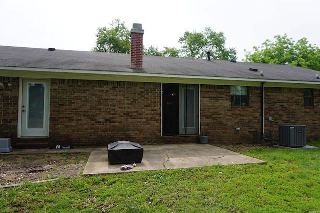 8 Tina Cir, Searcy, AR 72143 - rear view of property with a patio, a yard, a chimney, and brick siding