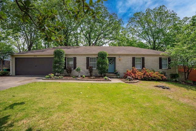 3016 Cleburne Pl, North Little Rock, AR 72116 - ranch-style home featuring brick siding, a garage, driveway, and a front lawn