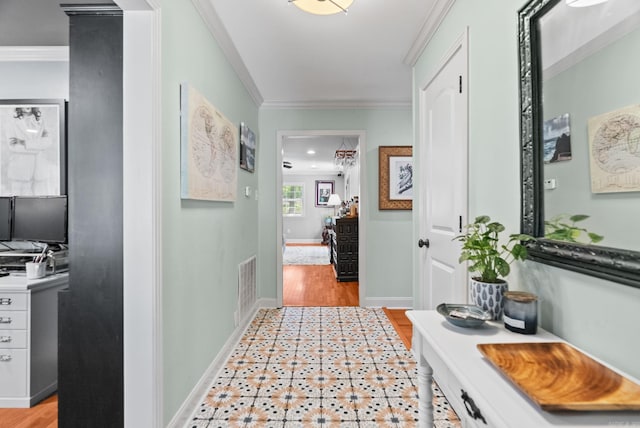 3016 Cleburne Pl, North Little Rock, AR 72116 - hallway with crown molding, light wood-style flooring, and baseboards