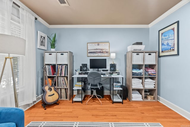 3016 Cleburne Pl, North Little Rock, AR 72116 - office area featuring ornamental molding, wood finished floors, and baseboards