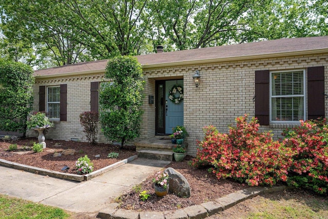 3016 Cleburne Pl, North Little Rock, AR 72116 - view of front facade with brick siding and a shingled roof