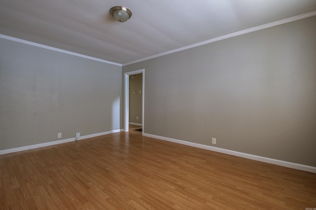 1318-1320 S Summit St, Little Rock, AR 72202 - unfurnished room with light wood finished floors, ornamental molding, and baseboards