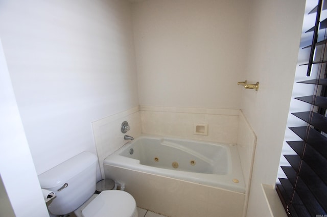 12601 Woodbury Dr, Little Rock, AR 72211 - full bathroom featuring toilet and a tub with jets