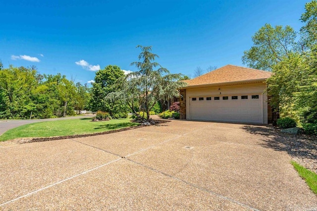 3 Pacifica Way, Hot Springs Village, AR 71909 - view of front of home with a front yard, concrete driveway, and an attached garage