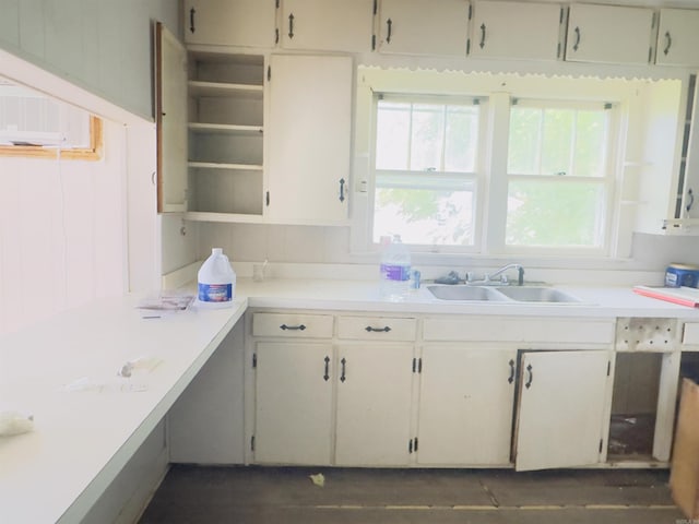 37 Maple St, Melbourne, AR 72556 - kitchen featuring a sink, open shelves, and light countertops