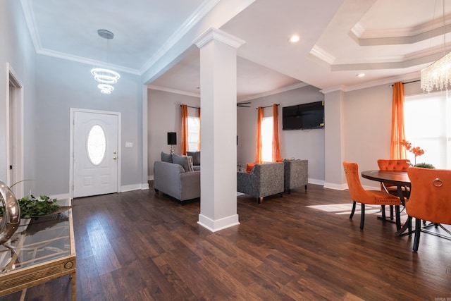 1608 S Cross St, Little Rock, AR 72206 - entrance foyer with a chandelier, dark wood-type flooring, crown molding, baseboards, and recessed lighting