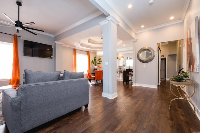 1608 S Cross St, Little Rock, AR 72206 - living room featuring ceiling fan, decorative columns, wood finished floors, ornamental molding, and baseboards