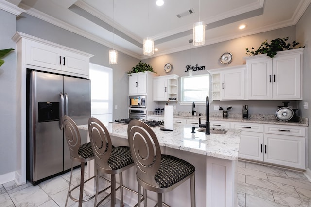 1608 S Cross St, Little Rock, AR 72206 - kitchen featuring appliances with stainless steel finishes, a sink, light marble finish flooring, a tray ceiling, and white cabinets
