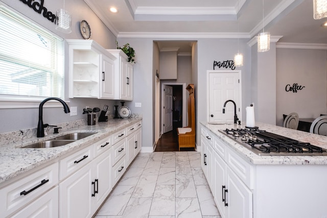 1608 S Cross St, Little Rock, AR 72206 - kitchen featuring a sink, stainless steel gas cooktop, light marble finish flooring, an island with sink, and recessed lighting