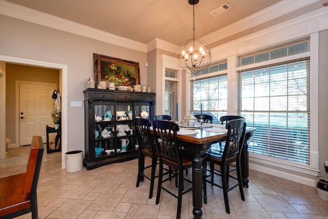 5718 Mediterranean Blvd, Benton, AR 72019 - dining area with a chandelier, ornamental molding, healthy amount of natural light, and stone tile floors