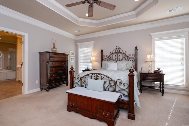 5718 Mediterranean Blvd, Benton, AR 72019 - bedroom featuring light carpet, a raised ceiling, crown molding, connected bathroom, and baseboards