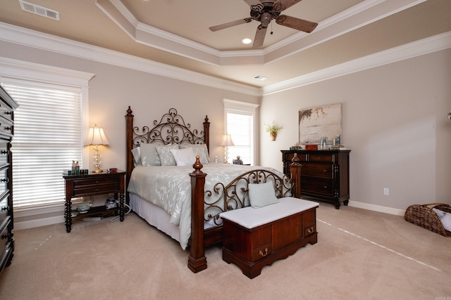 5718 Mediterranean Blvd, Benton, AR 72019 - bedroom with a tray ceiling, light colored carpet, crown molding, baseboards, and a ceiling fan