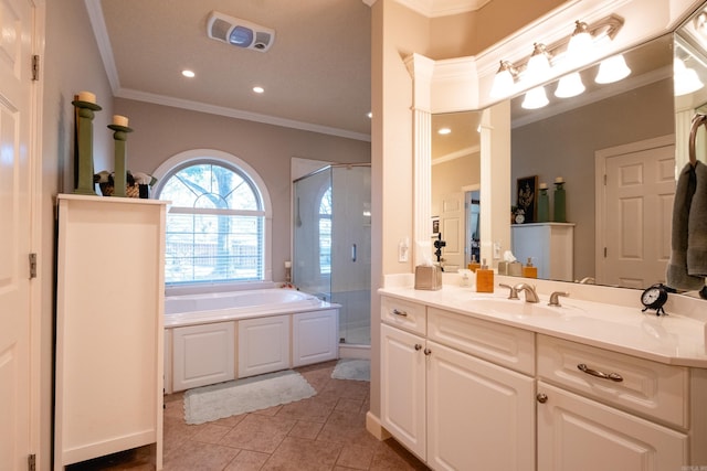 5718 Mediterranean Blvd, Benton, AR 72019 - bathroom with crown molding, a shower stall, a garden tub, vanity, and tile patterned floors