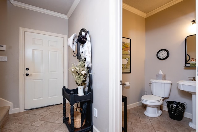 5718 Mediterranean Blvd, Benton, AR 72019 - bathroom with stone tile floors, baseboards, crown molding, and toilet