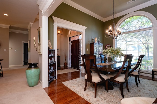 5718 Mediterranean Blvd, Benton, AR 72019 - dining room featuring ornamental molding, baseboards, a chandelier, wood finished floors, and recessed lighting