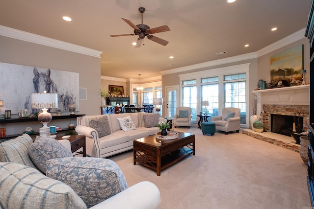 5718 Mediterranean Blvd, Benton, AR 72019 - carpeted living area with crown molding, recessed lighting, ceiling fan, a stone fireplace, and a chandelier