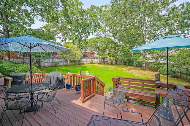wooden deck with outdoor dining area