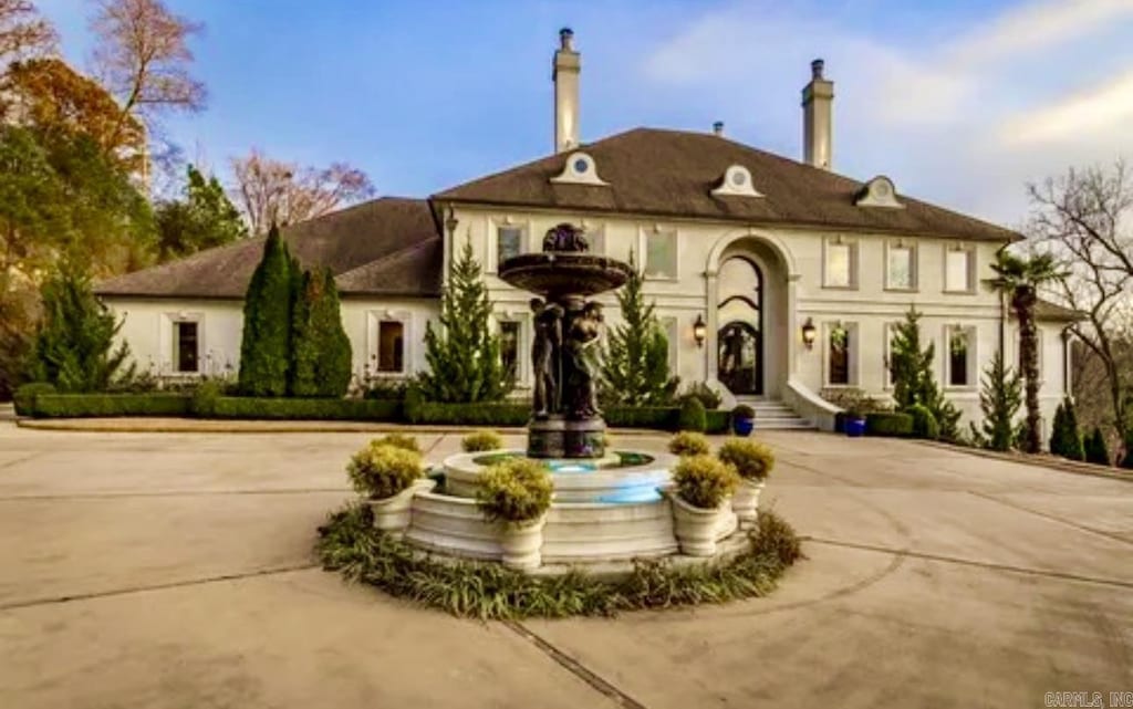 3700 Avondale Rd, North Little Rock, AR 72116 - french country style house with curved driveway and a chimney