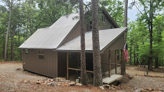 180 Herschel B Guinn Rd, Story, AR 71970 - view of home's exterior with metal roof