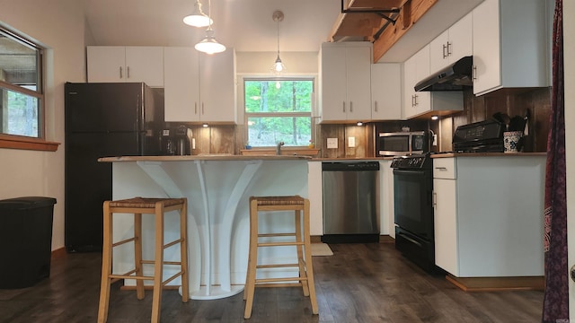 180 Herschel B Guinn Rd, Story, AR 71970 - kitchen featuring black appliances, under cabinet range hood, decorative backsplash, and white cabinets
