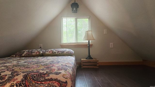 180 Herschel B Guinn Rd, Story, AR 71970 - bedroom with dark wood-style flooring, vaulted ceiling, and baseboards