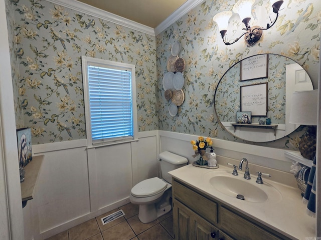 615 Miller Cv, Benton, AR 72019 - bathroom featuring crown molding, wainscoting, tile patterned floors, toilet, and vanity
