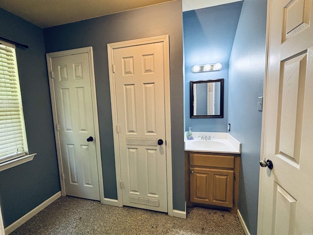 615 Miller Cv, Benton, AR 72019 - bathroom with vanity and baseboards