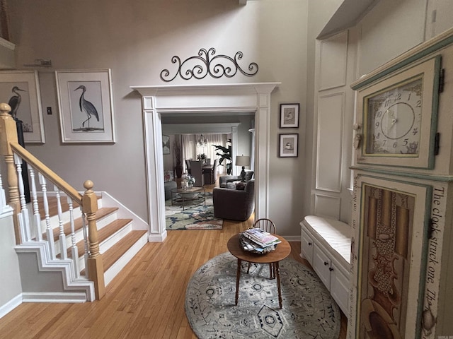 615 Miller Cv, Benton, AR 72019 - entrance foyer featuring baseboards, light wood-type flooring, and stairway