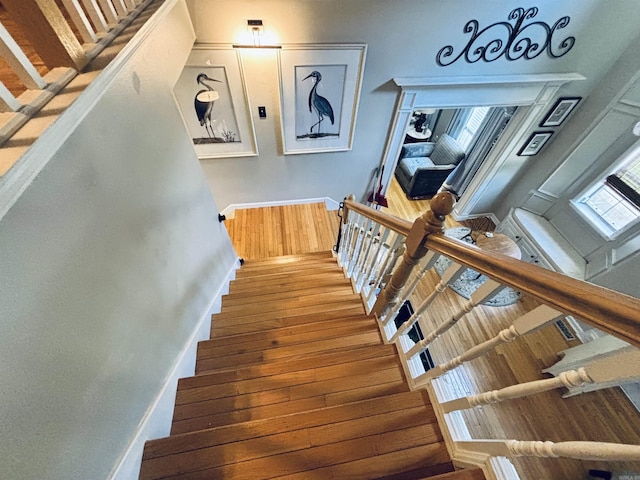 615 Miller Cv, Benton, AR 72019 - stairway with wood finished floors and baseboards