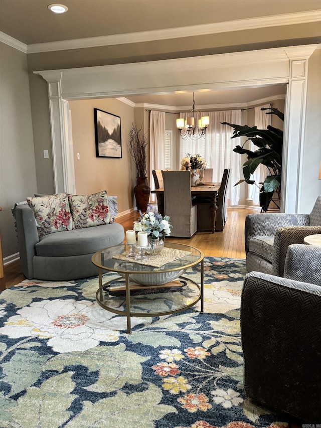 615 Miller Cv, Benton, AR 72019 - living area featuring light wood-type flooring, crown molding, a chandelier, recessed lighting, and baseboards