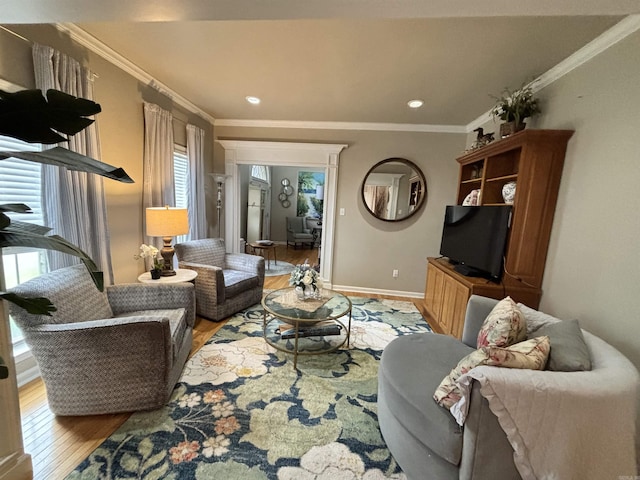 615 Miller Cv, Benton, AR 72019 - living area with wood finished floors, crown molding, baseboards, and recessed lighting