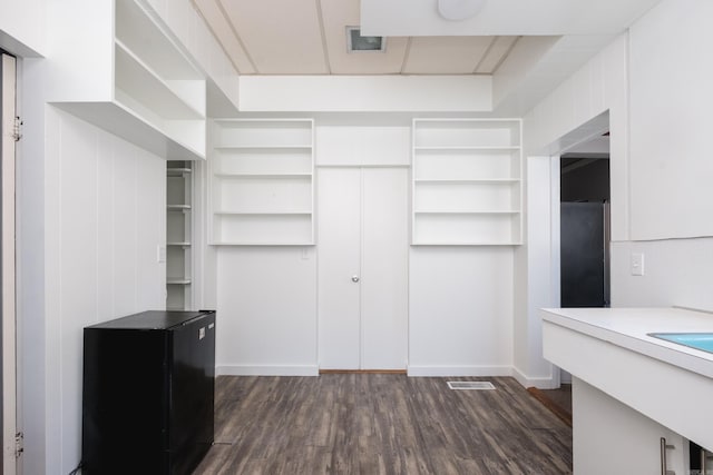 1224 S Fillmore St, Little Rock, AR 72204 - spacious closet featuring dark wood-style floors