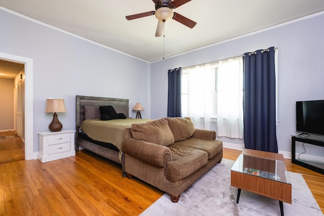 1224 S Fillmore St, Little Rock, AR 72204 - bedroom featuring light wood-style floors, crown molding, baseboards, and ceiling fan