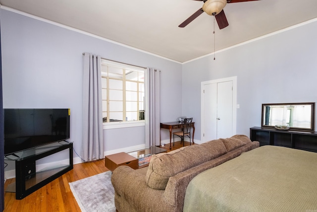 1224 S Fillmore St, Little Rock, AR 72204 - bedroom featuring crown molding, wood finished floors, a ceiling fan, and baseboards