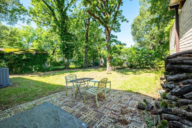 1224 S Fillmore St, Little Rock, AR 72204 - view of patio featuring central air condition unit and outdoor dining space