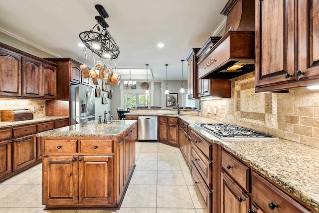 5410 Lexington Ave, Benton, AR 72019 - kitchen featuring appliances with stainless steel finishes, light stone counters, tasteful backsplash, light tile patterned floors, and recessed lighting