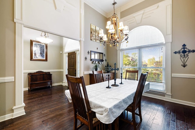 5410 Lexington Ave, Benton, AR 72019 - dining space with dark wood-type flooring, a chandelier, baseboards, ornamental molding, and a towering ceiling