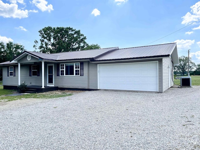806 Autumnwood Rd, Ash Flat, AR 72513 - ranch-style home with metal roof, gravel driveway, covered porch, and central AC