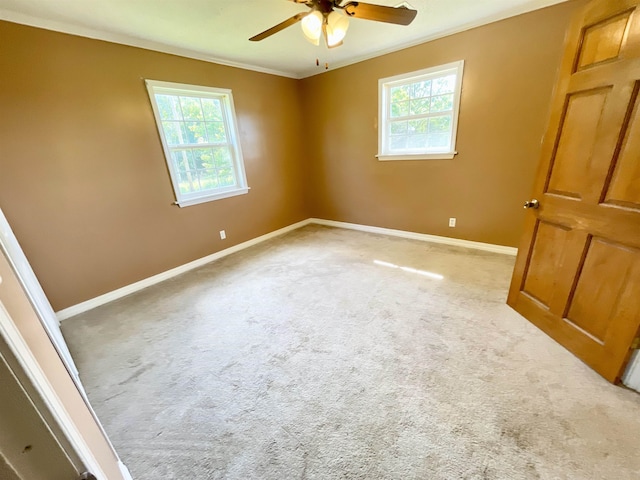 806 Autumnwood Rd, Ash Flat, AR 72513 - spare room featuring healthy amount of natural light, a ceiling fan, baseboards, and crown molding