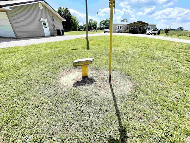 806 Autumnwood Rd, Ash Flat, AR 72513 - view of grassy yard with central AC unit