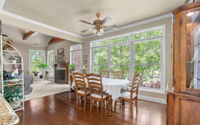 26 Pillar Ln, Hot Springs Village, AR 71909 - dining room with ceiling fan, wood finished floors, a fireplace, crown molding, and baseboards