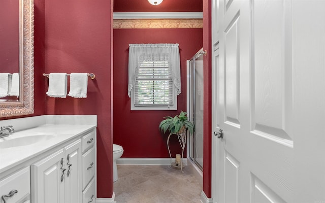 26 Pillar Ln, Hot Springs Village, AR 71909 - full bathroom with a stall shower, vanity, baseboards, and toilet