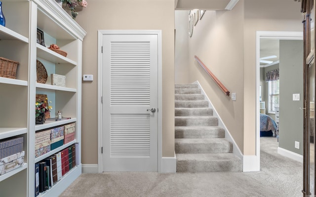 26 Pillar Ln, Hot Springs Village, AR 71909 - stairs with carpet flooring, baseboards, and a ceiling fan