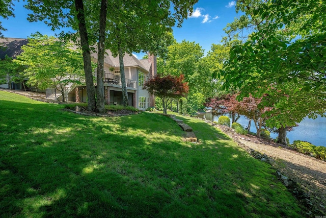 26 Pillar Ln, Hot Springs Village, AR 71909 - view of grassy yard with a water view