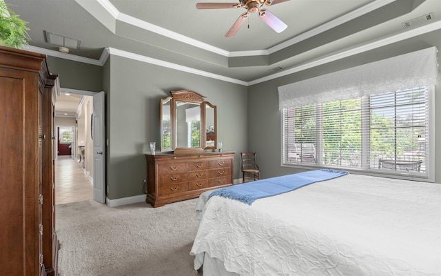 26 Pillar Ln, Hot Springs Village, AR 71909 - bedroom featuring a raised ceiling, light carpet, crown molding, baseboards, and ceiling fan