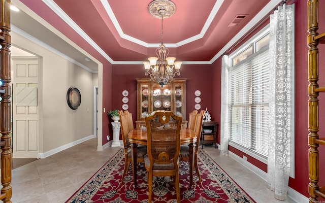 26 Pillar Ln, Hot Springs Village, AR 71909 - dining area featuring a chandelier, a raised ceiling, baseboards, and crown molding