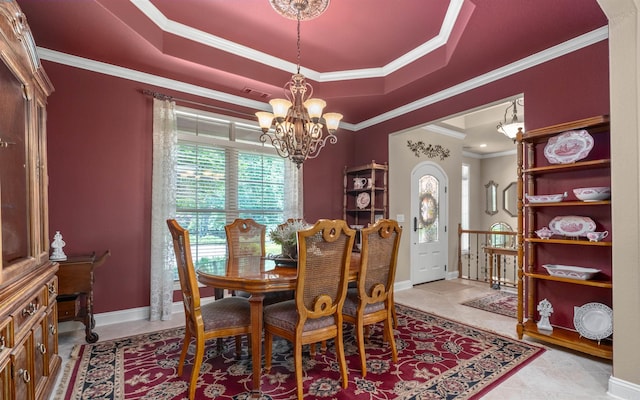 26 Pillar Ln, Hot Springs Village, AR 71909 - dining room with a chandelier, a raised ceiling, crown molding, and baseboards