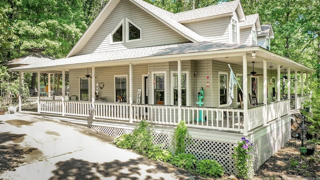 420 Shadow Ln, Clinton, AR 72031 - farmhouse featuring covered porch, a shingled roof, and ceiling fan