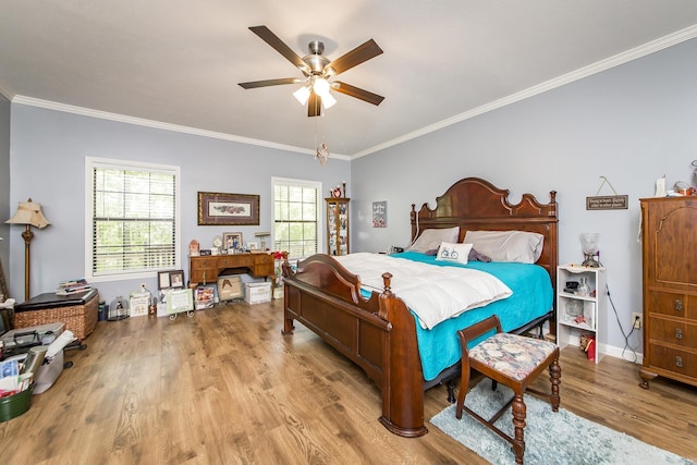 420 Shadow Ln, Clinton, AR 72031 - bedroom with wood finished floors, crown molding, baseboards, and a ceiling fan