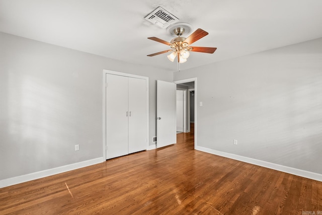 1118 Garland, North Little Rock, AR 72216 - unfurnished bedroom with baseboards, wood finished floors, a closet, and ceiling fan